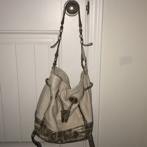 Tan Jaw string handbag